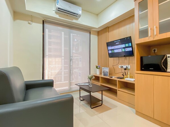 Living area - Cozy And Minimalist 1Br With Working Room Meikarta Apartment (Cikarang)
