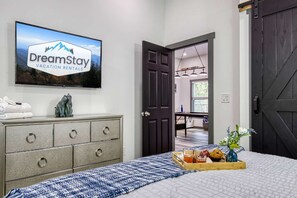 4 bedrooms, iron/ironing board, travel cot, WiFi