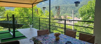 Apartment with balcony and mountains panoramic view