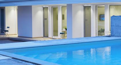 Guest house with swimming pool surrounded by greenery, 500 meters from Trentova Bay.