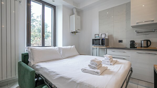 2 habitaciones, tabla de planchar con plancha y wifi gratis 