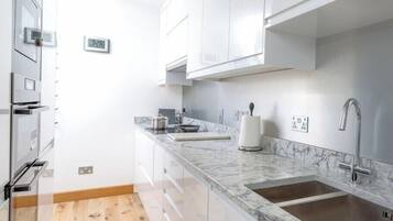 Luxury Apartment | Private kitchen | Espresso maker, coffee/tea maker, full-sized fridge, microwave