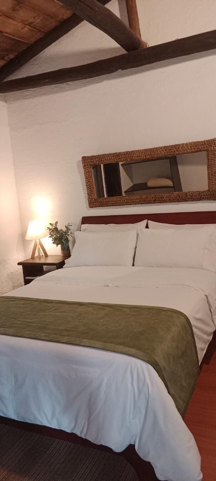 Egyptian cotton sheets, premium bedding, down duvets, laptop workspace