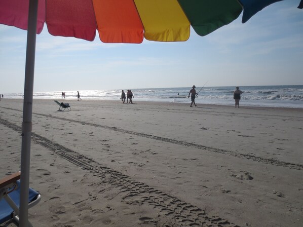 On the beach, sun-loungers, beach towels