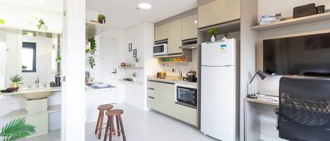 Cortinas blackout, tabla de planchar con plancha y wifi gratis