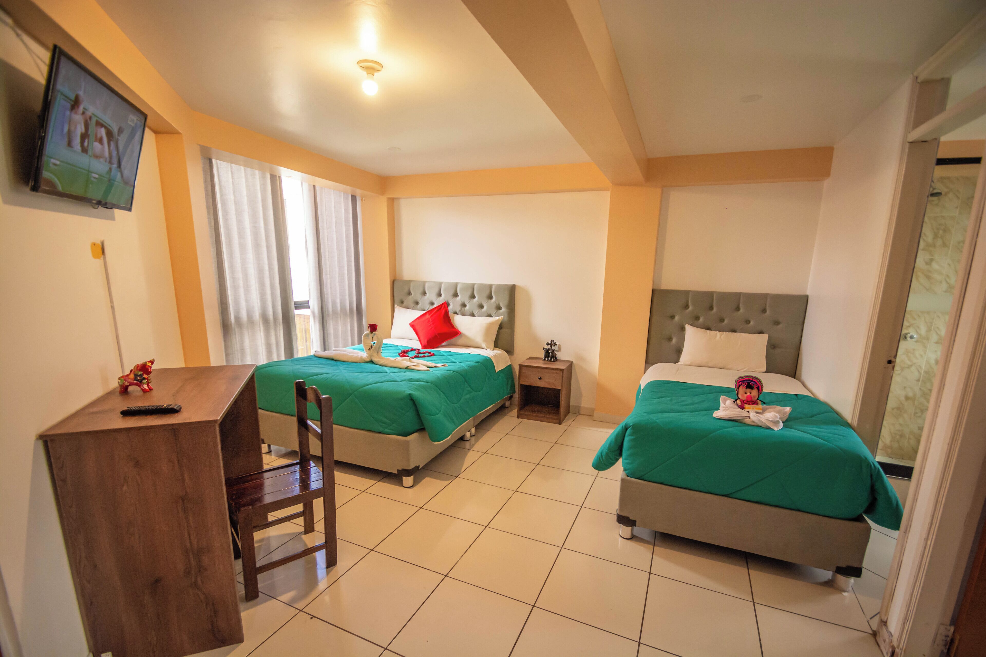 Standard Quadruple Room | Individually decorated, desk, laptop workspace, free WiFi