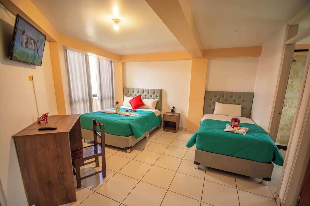 Standard Quadruple Room | Individually decorated, desk, laptop workspace, free WiFi