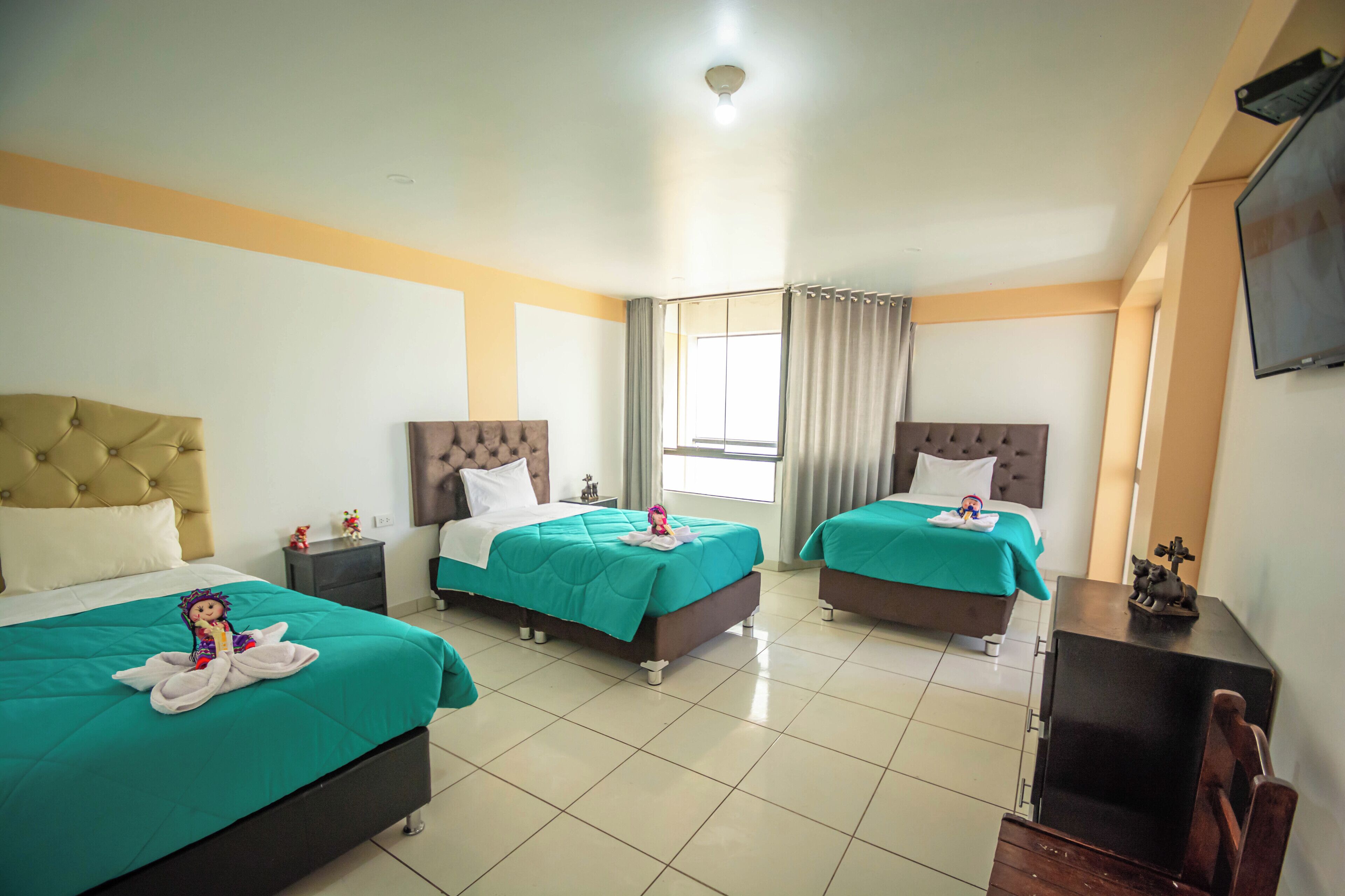 Standard Triple Room, 3 Single Beds | Individually decorated, desk, laptop workspace, free WiFi