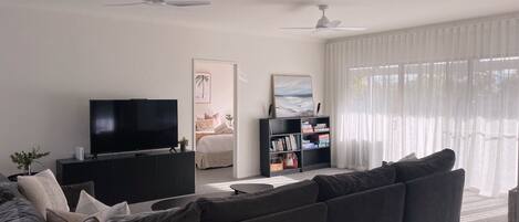 TV, fireplace, books, stereo