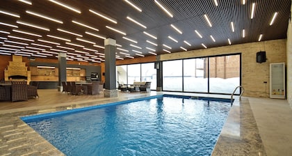 Wooden Villa with pool and sauna