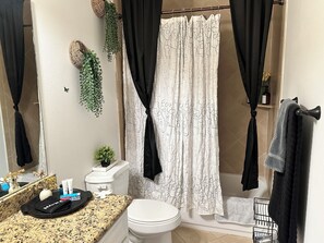 Hair dryer, towels, soap, toilet paper