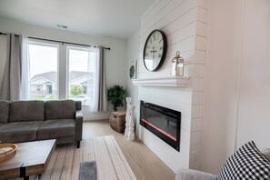 Smart TV, fireplace, foosball, books