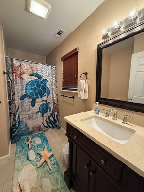 Shower, towels, soap, shampoo