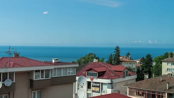 Quarto quádruplo executivo, para não fumantes | Frigobar, cofres nos quartos, escrivaninha