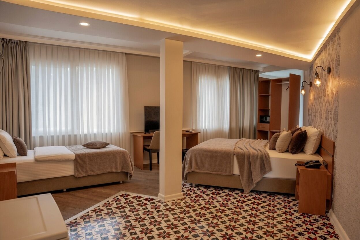 Executive-værelse til 4 personer - ikke-ryger | Minibar, pengeskab på værelset, skrivebord