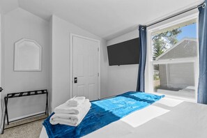 2 bedrooms, desk, iron/ironing board, travel cot