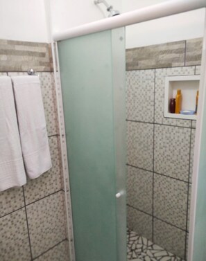 Shower, towels, toilet paper