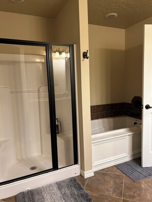 Jetted bath, hair dryer, towels, soap