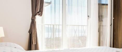 Apartment, Sea View | Laptop workspace, blackout drapes, iron/ironing board, free WiFi