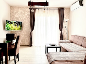Apartment, Sea View | Laptop workspace, blackout drapes, iron/ironing board, free WiFi