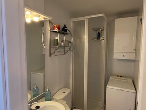 Shower, towels, toilet paper