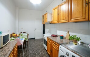 Fridge, microwave, stovetop, cookware/dishes/utensils