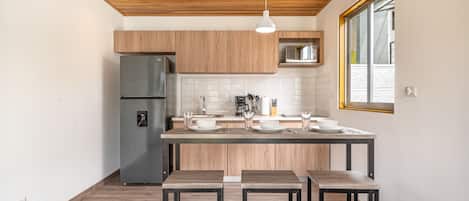 Fridge, microwave, stovetop, coffee/tea maker