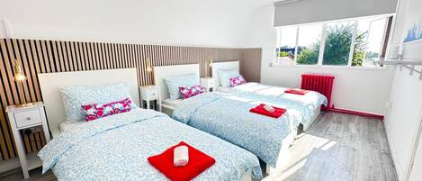 1 slaapkamer, een strijkplank/strijkijzer, wifi, beddengoed