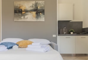 1 quarto, Wi-Fi de cortesia, roupa de cama