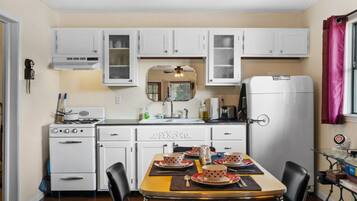 Fridge, microwave, stovetop, coffee/tea maker