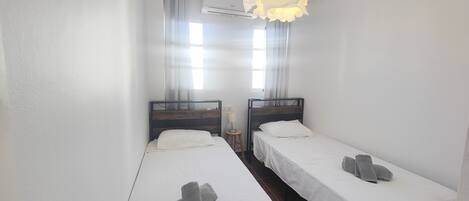 2 dormitorios, tabla de planchar con plancha, wifi gratis y ropa de cama
