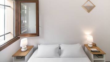 1 habitación, tabla de planchar con plancha, wifi gratis y ropa de cama