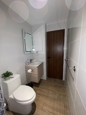 Hair dryer, towels, soap, toilet paper