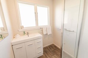Hair dryer, towels, soap, toilet paper