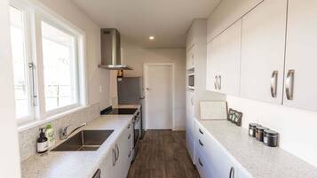 Coffee/tea maker, fridge, microwave, oven