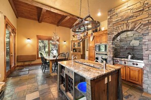 Fridge, microwave, oven, stovetop - Pine Haven- Luxe home w/ hot tub, game room, gourmet kitchen, AC, & pets allowed (McCall)