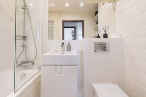 Hair dryer, towels, soap, shampoo
