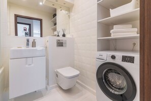 Hair dryer, towels, soap, shampoo