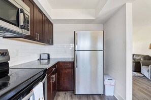 Fridge, microwave, oven, stovetop - Sleek 2BR Townhouse, Stones throw to Uptown (Charlotte)