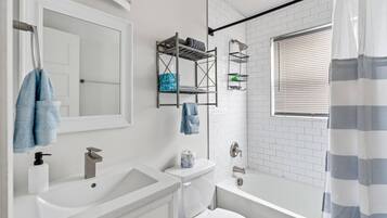 Hair dryer, towels, soap, toilet paper