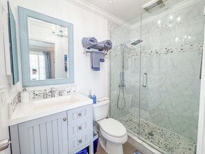 Shower, hair dryer, towels