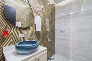 Shower, hair dryer, towels, soap