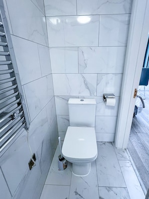 Hair dryer, towels, soap, toilet paper