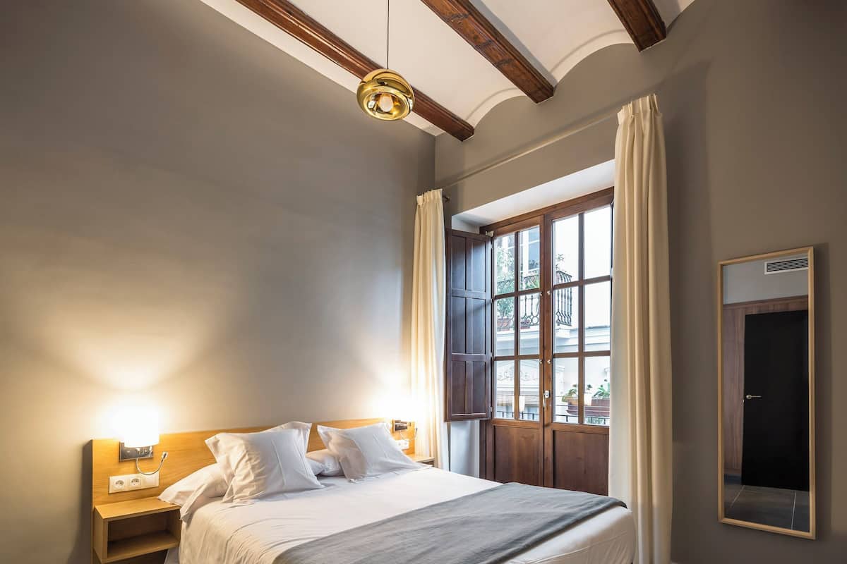 Premium bedding, down duvets, Select Comfort beds, minibar