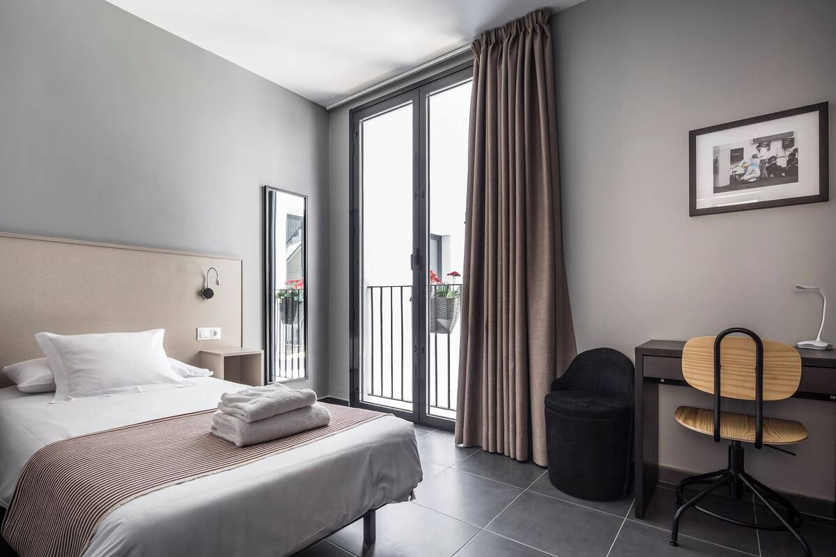 Premium bedding, down duvets, Select Comfort beds, minibar