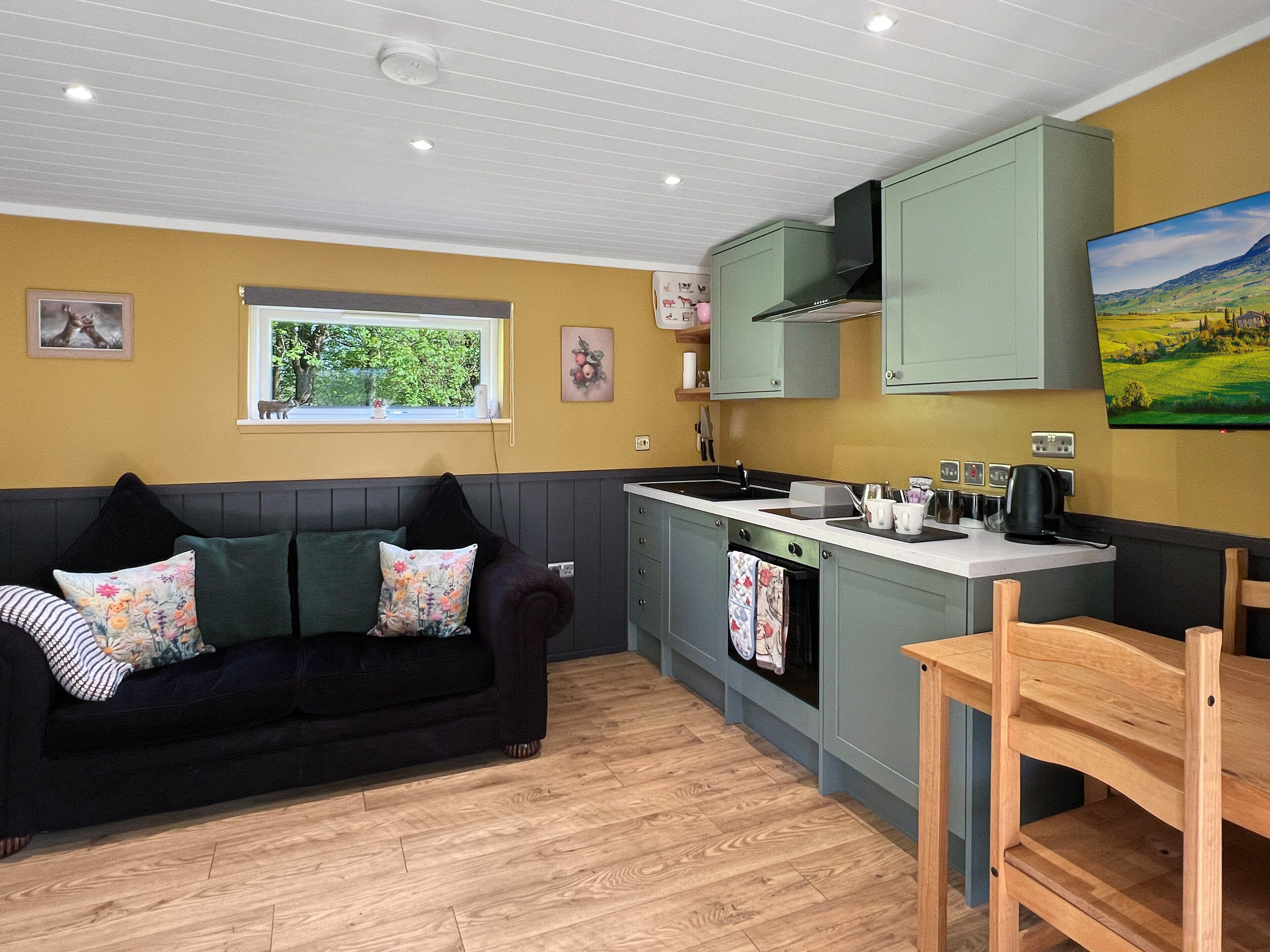 Fridge, oven, toaster, dining tables