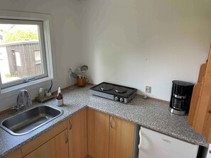 Fridge, stovetop, coffee/tea maker, electric kettle