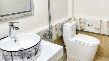 Family Triple Room, City View | Bathroom | Shower, hydromassage showerhead, hair dryer (on request), slippers