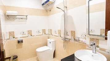 Standard Double Room, City View | Bathroom | Shower, hydromassage showerhead, hair dryer (on request), slippers
