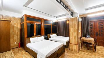 Family Double or Twin Room, Private Bathroom, City View | Premium bedding, minibar (some free items), desk, laptop workspace